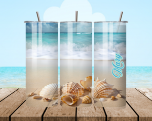 All sides of tumbler showing seashells on beach with ocean waves